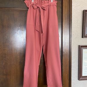 Pale pink pencil pants. Never worn. No tags. Perfect condition.